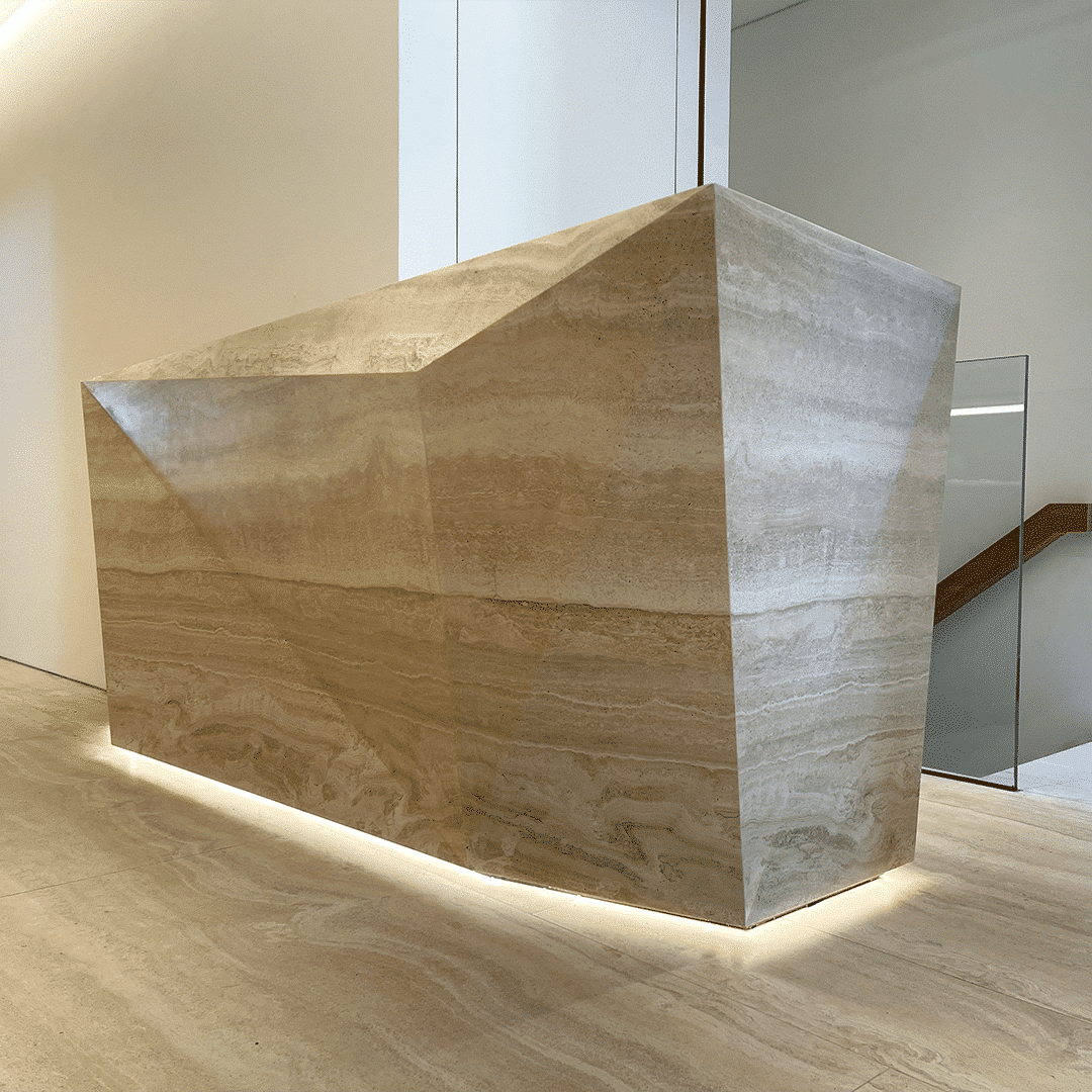 modern entrance with Concierge desk with natural stone in artful form